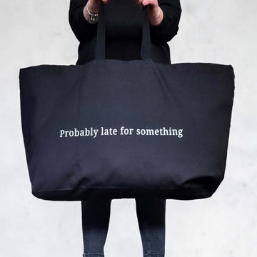 extra large black canvas tote bag with a custom text 'Probably late for something'