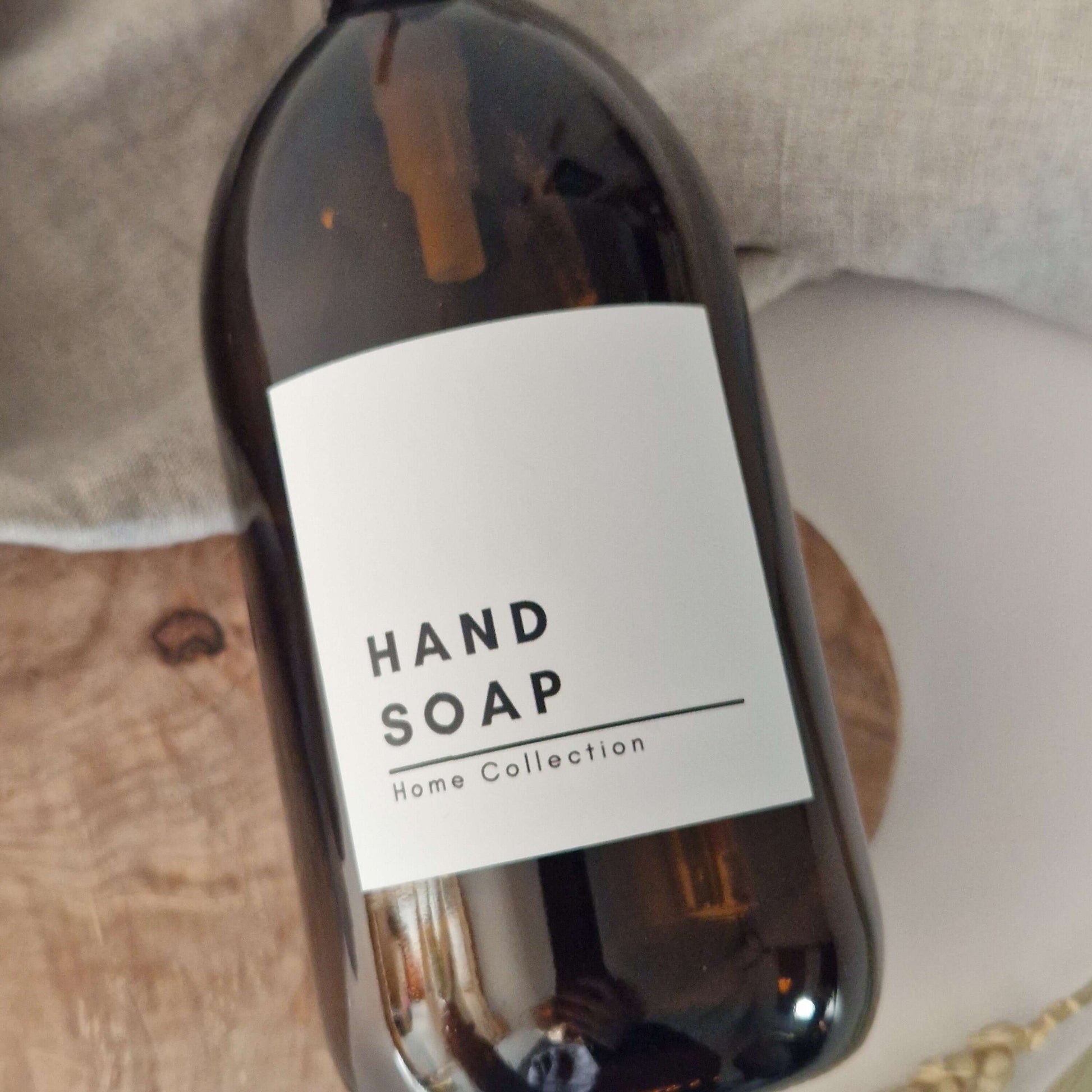 Applying a personalised label to a clear refill bottle