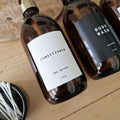 Custom label sheet with waterproof minimalist text for refillable bottles