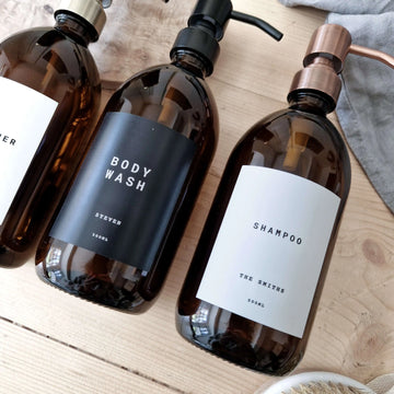 Personalised minimalist label on amber soap dispenser bottle for bathroom or kitchen. add family name for extra personal touch