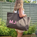 extra large olive bag with a baby pink personalised initials design