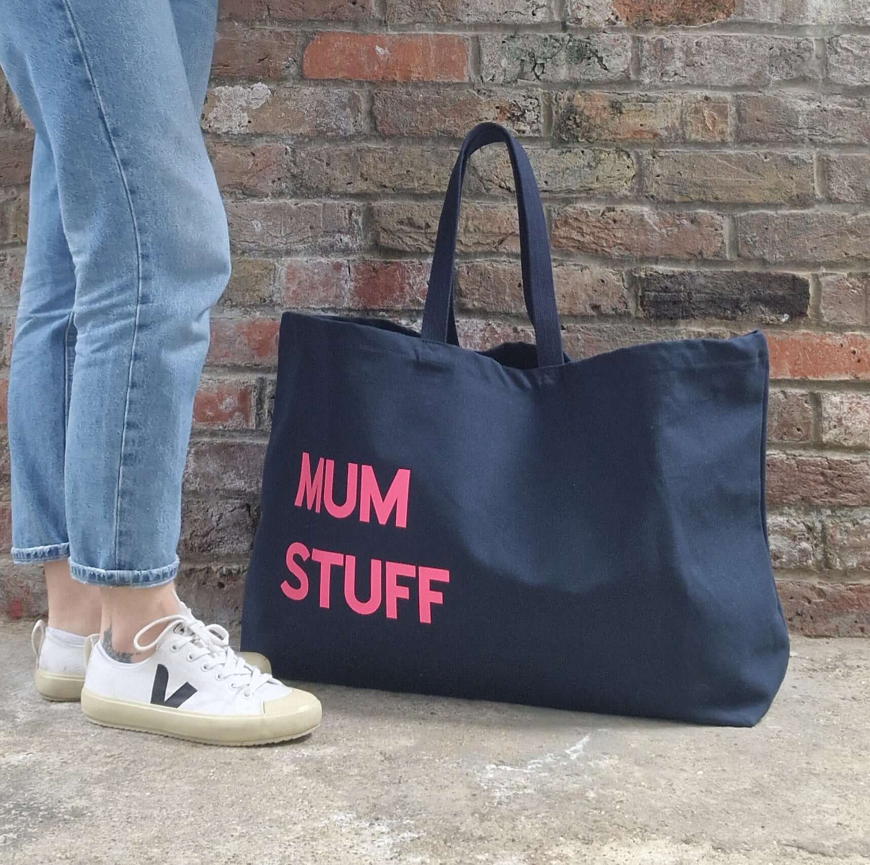 Extra large tote bag in navy with a neon pink text 'mum stuff'
