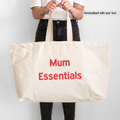 Personalised extra large mum tote bag in natural canvas with red text 'Mum Essentials' 