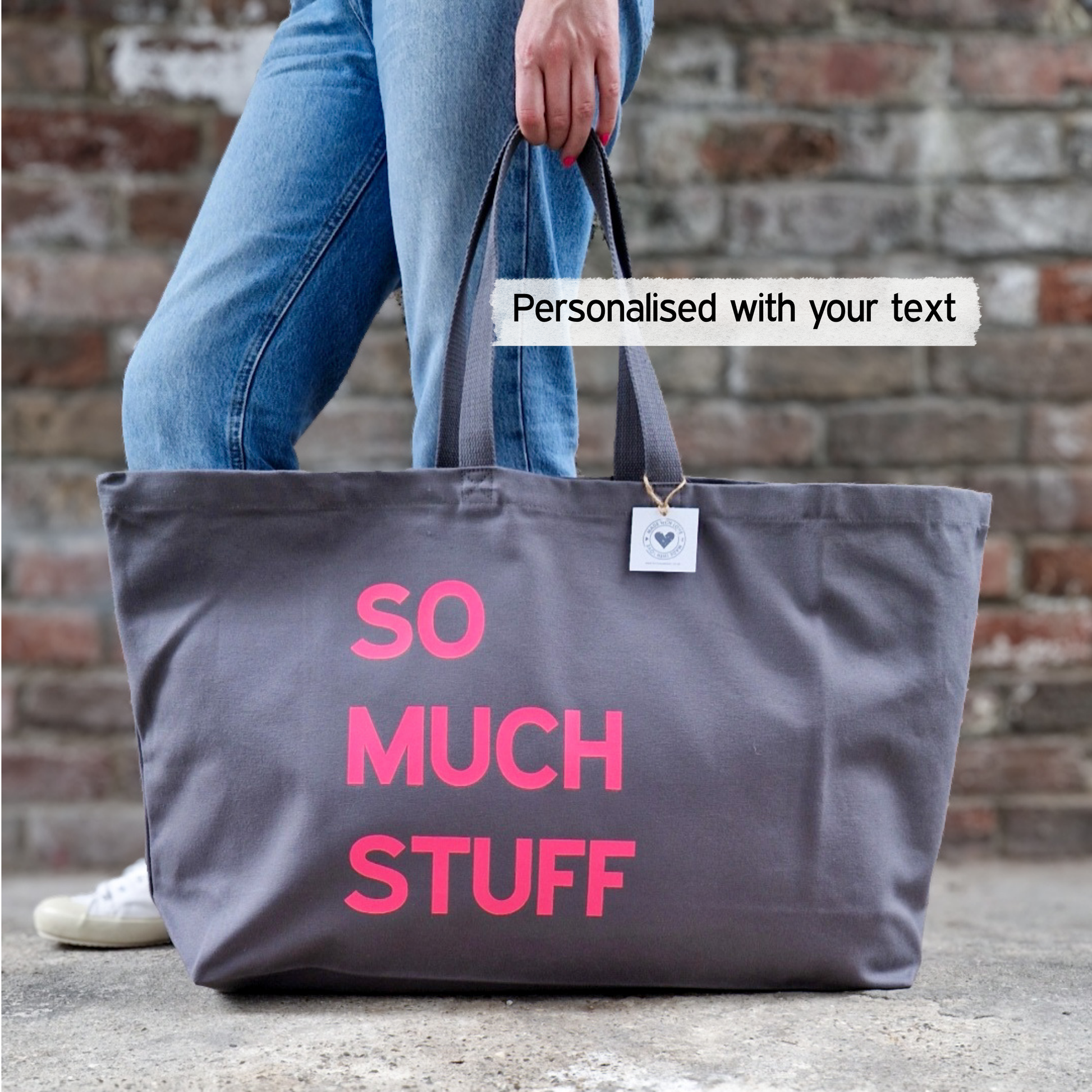 a shot of the tote showing that all text on the bag can be personalised