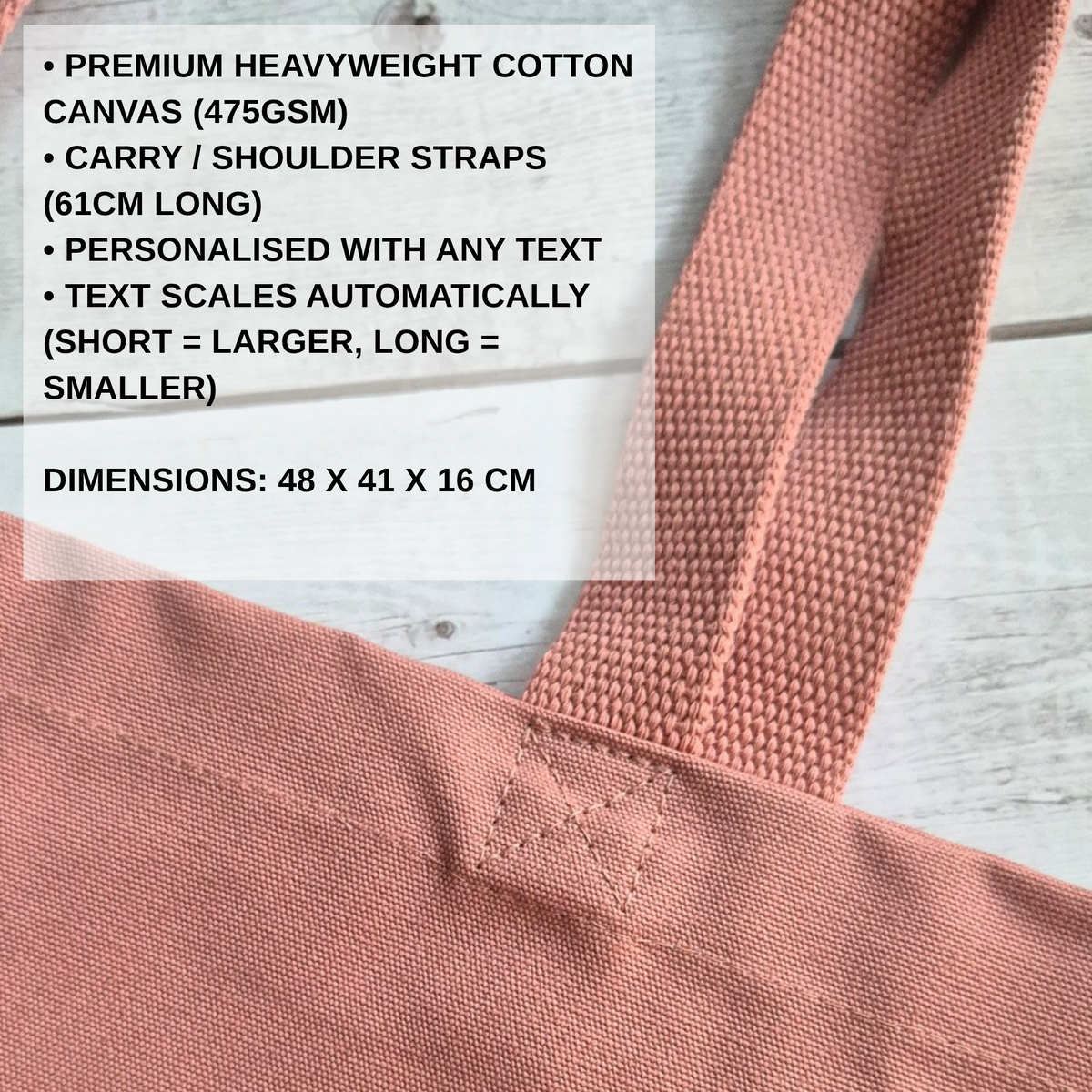 A close-up of a dusty rose pink canvas tote bag strap with a text overlay detailing product specifications and dimensions.